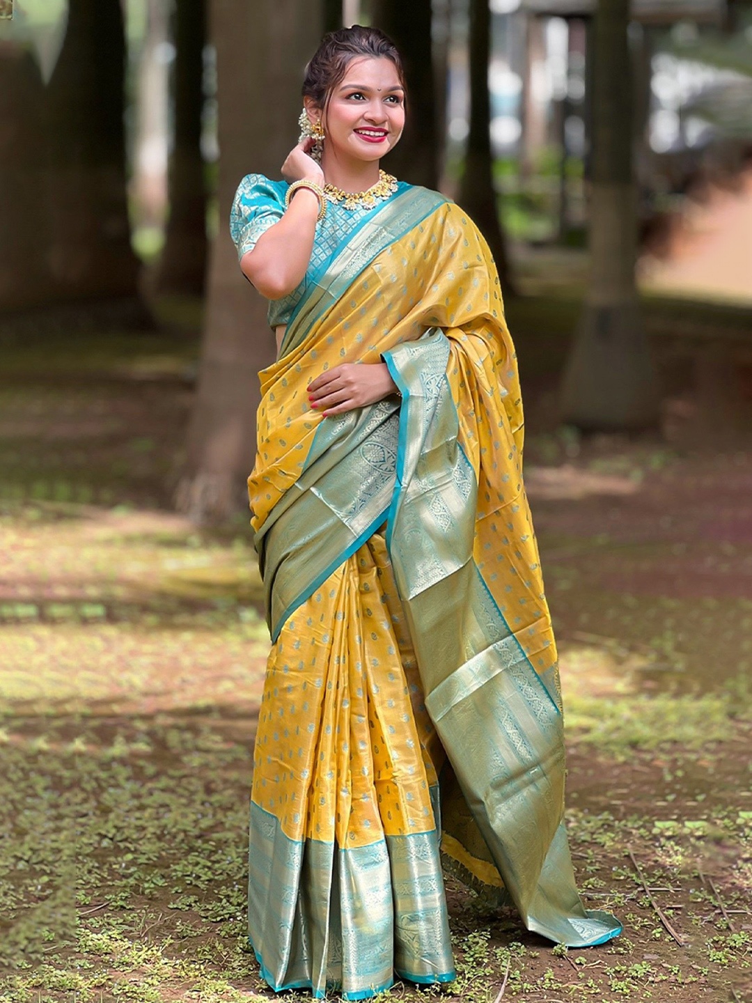 

Rangtulika Ethnics Woven Design Zari Kanjeevaram Saree, Yellow