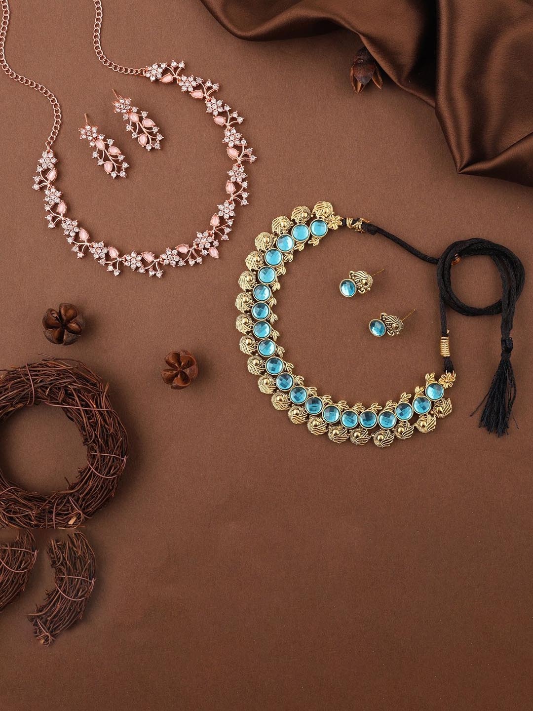 

Lyriss Set Of 2 Gold & Rose Gold Plated American Diamond Stone Studded Jewellery Set