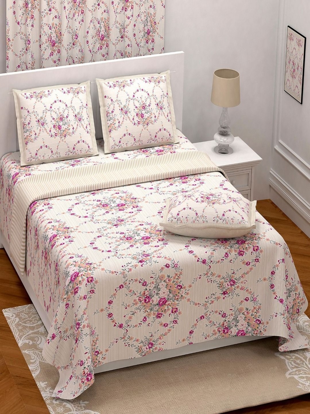 

Myntra Elegant Homes Pink & Beige Floral 250 TC King Bedsheet with 2 Pillow Covers