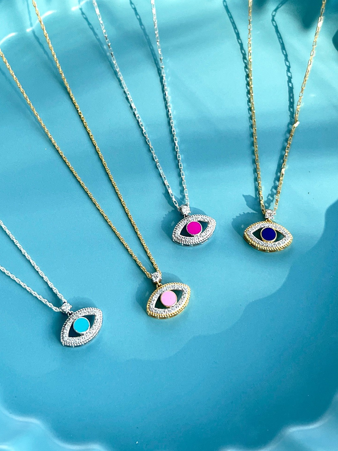 

Ruuh Studios Gold-Plated Cubic Zirconia Studded Nyana Evil Eye Pendants With Chains