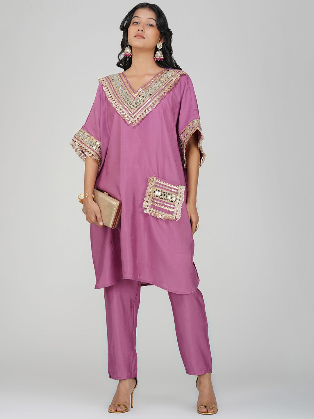 

Charitra Women Embroidered Regular Sequinned Kurti with Trousers, Mauve