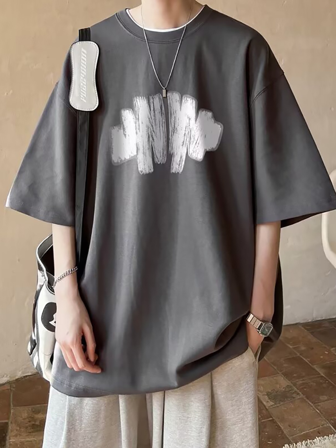 

StyleCast x Revolte Men Graphic Printed Round Neck Cotton Oversized T-shirt, Grey
