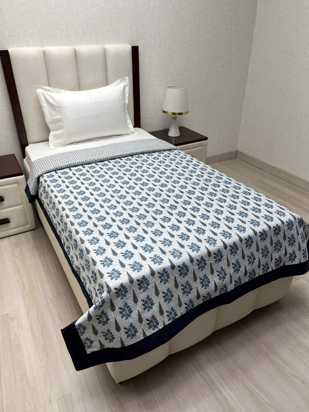 

Pure Decor Sole Silken White & Blue Floral Printed AC Room Single Bed Dohar