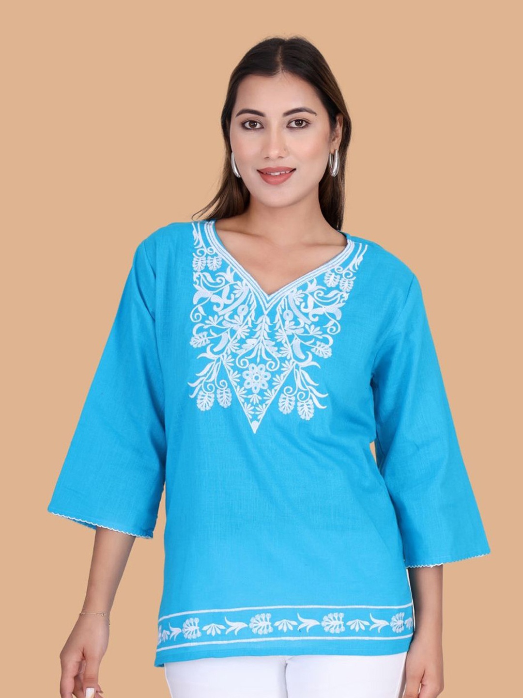 

Moda Rapido Floral Embroidered Flared Sleeves Thread Work Pure Cotton Thread Work Kurti, Blue