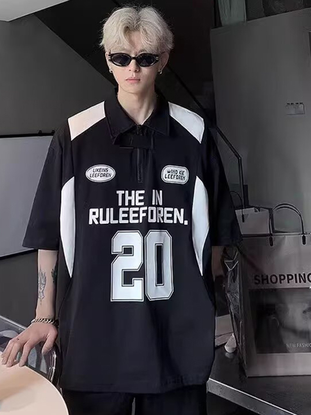 

StyleCast x Revolte Men Typography Printed Polo Collar Oversized T-shirt, Black