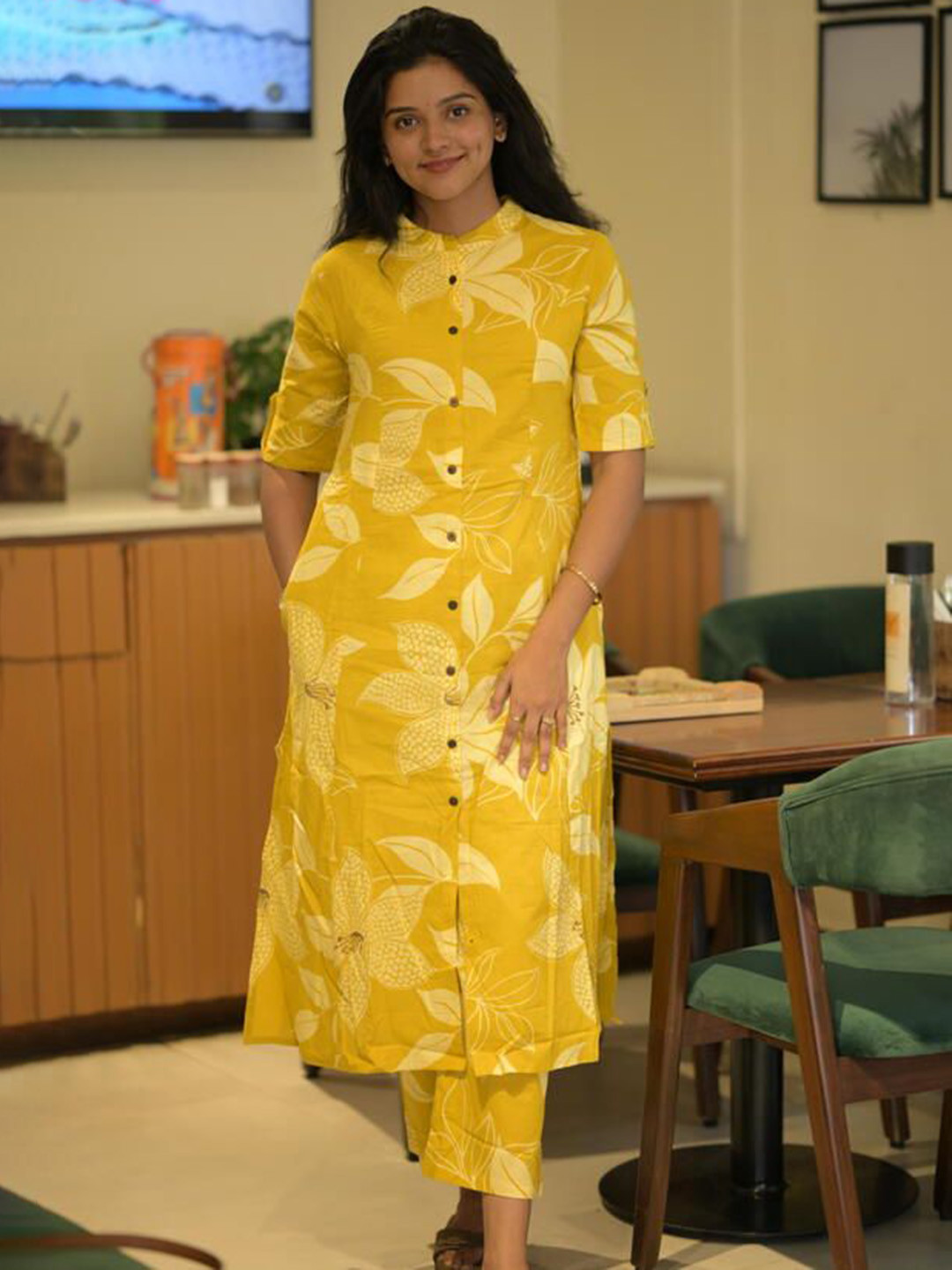 

GoSriKi Women Floral Printed Regular Kurta with Palazzos, Yellow