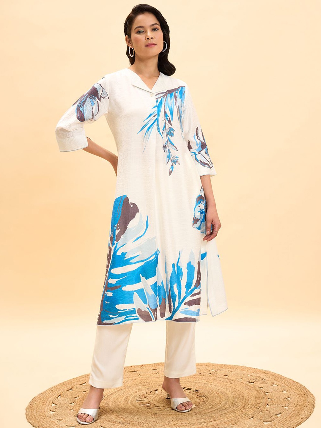 

Marigold Lane Women Quirky Flared Sleeves Thread Work Kurta, Blue