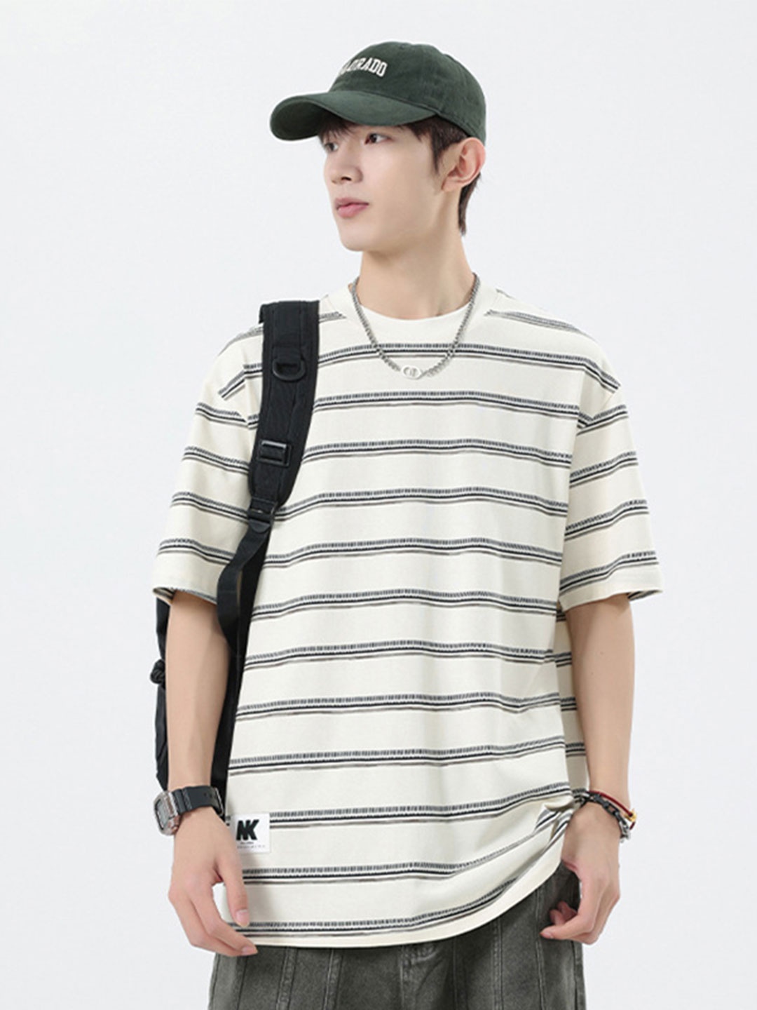 

StyleCast x Revolte Men Striped T-shirt, Black