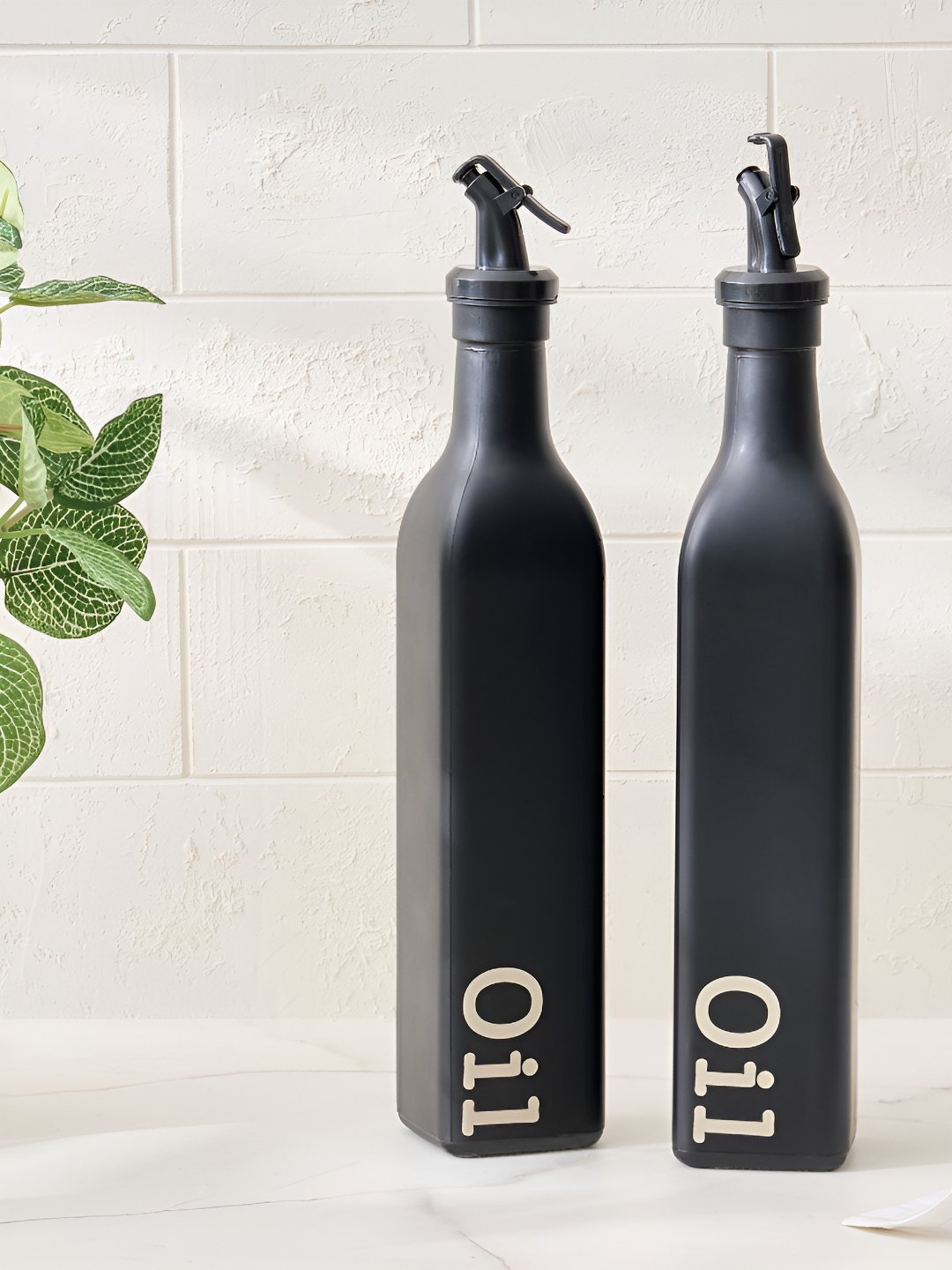 

Home Centre Spinel Onyx 2-Pcs Black & White Printed Glass Oil Dispensers - 500ml