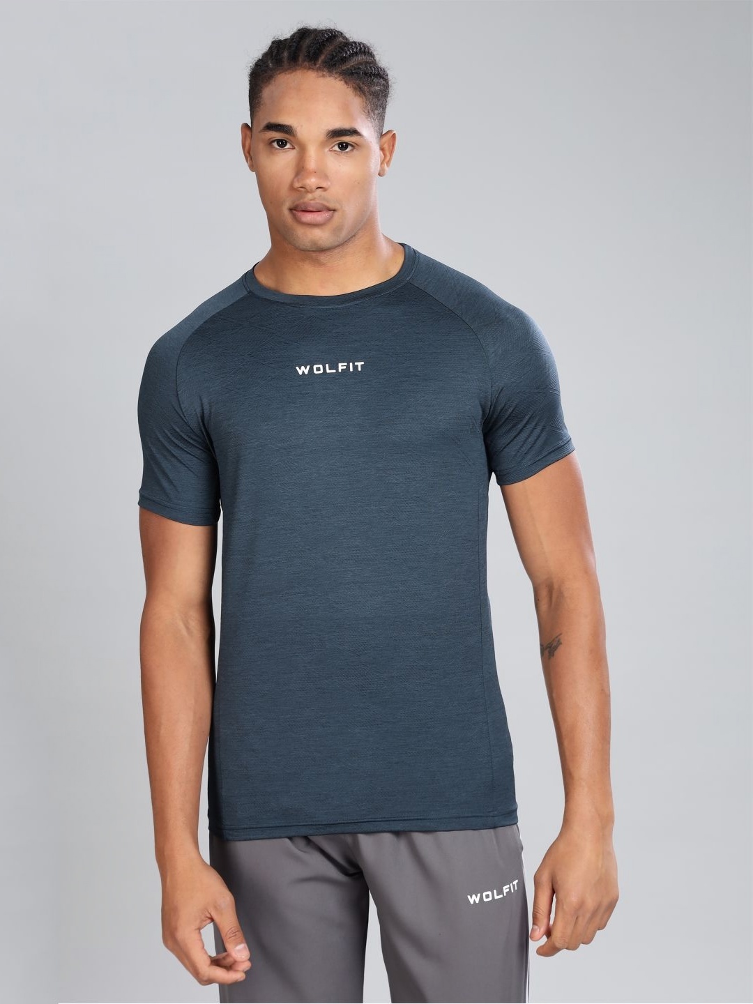 

WOLFIT ATHLEISURE Men Typography Dri-FIT Raw Edge Slim Fit T-shirt, Blue