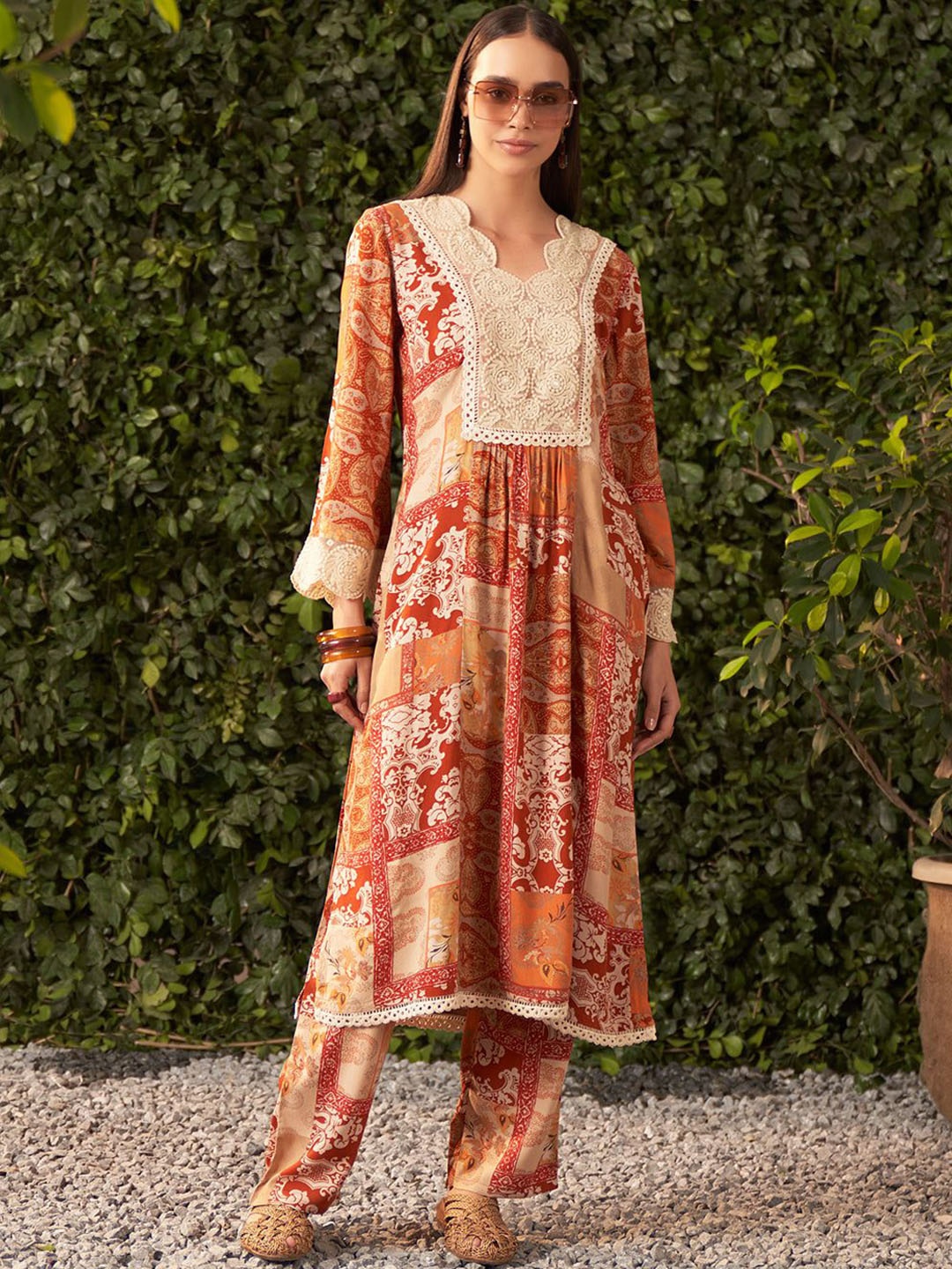 

Lakshita Women Floral Printed Regular Thread Work Kurta with Trousers, Rust