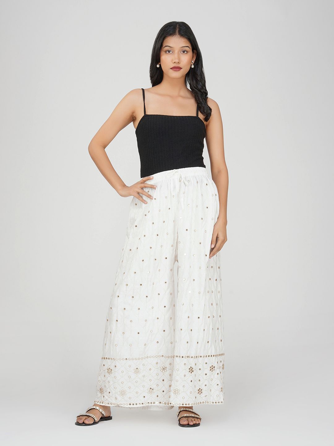

Charitra Women Ethnic Motifs Embroidered Flared Ethnic Palazzos, White