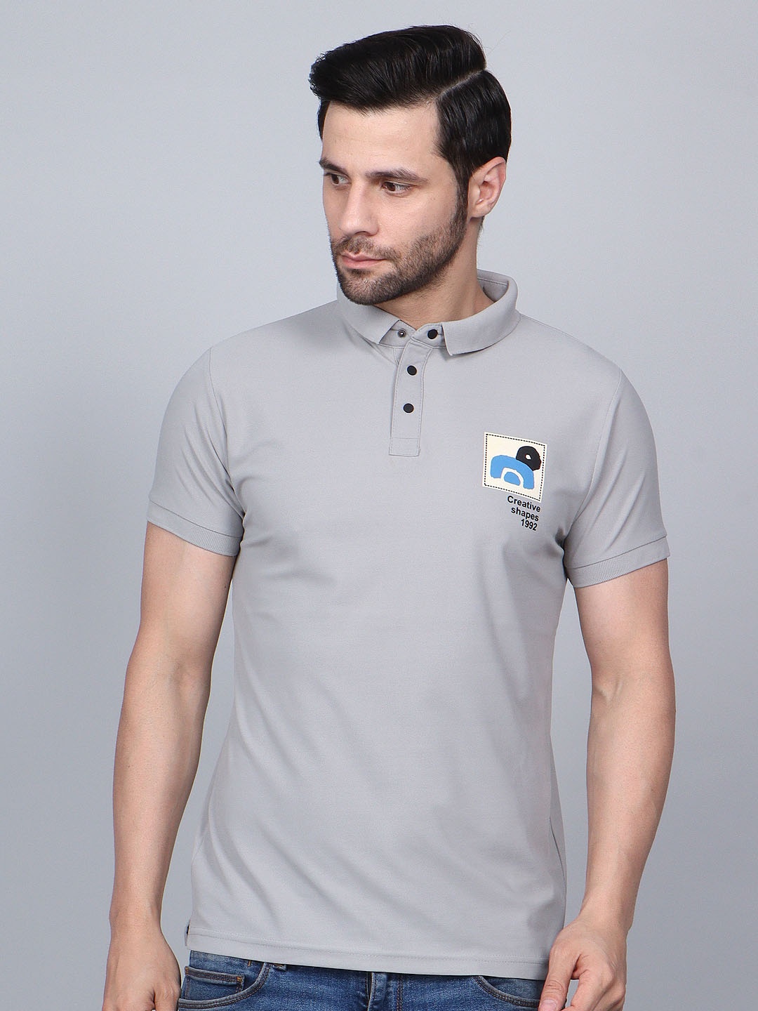 

Fitcore Men Dri-FIT Solid Polo Collar T-shirt, Grey
