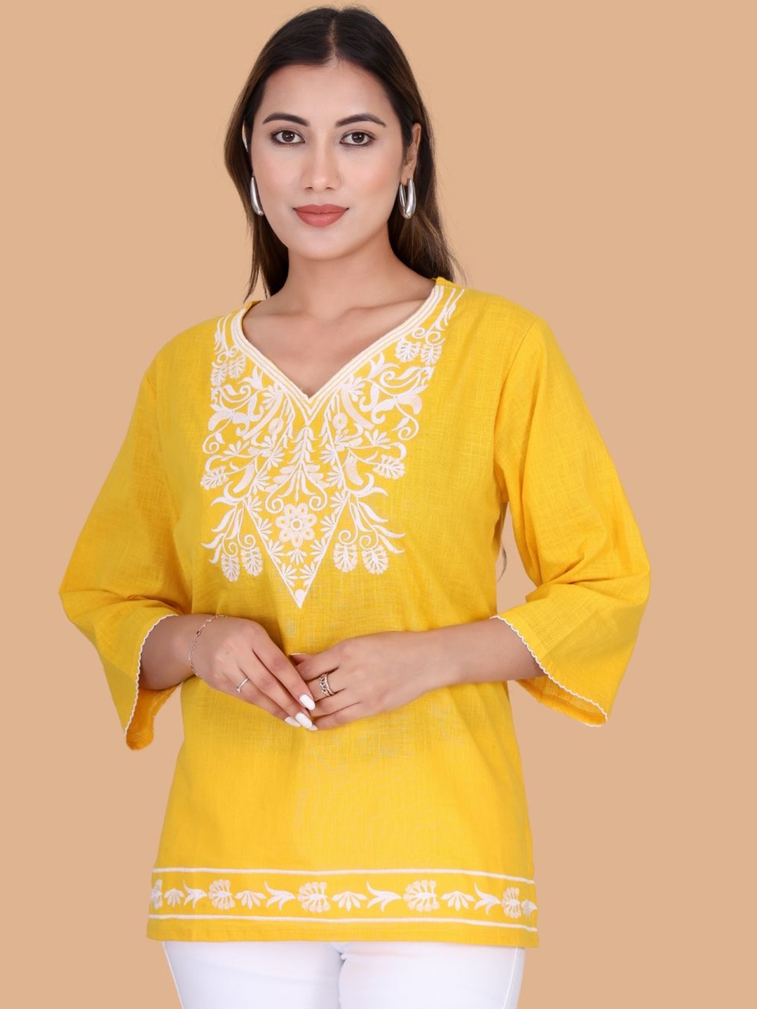

Moda Rapido Floral Embroidered Flared Sleeves Pure Cotton Kurti, Yellow