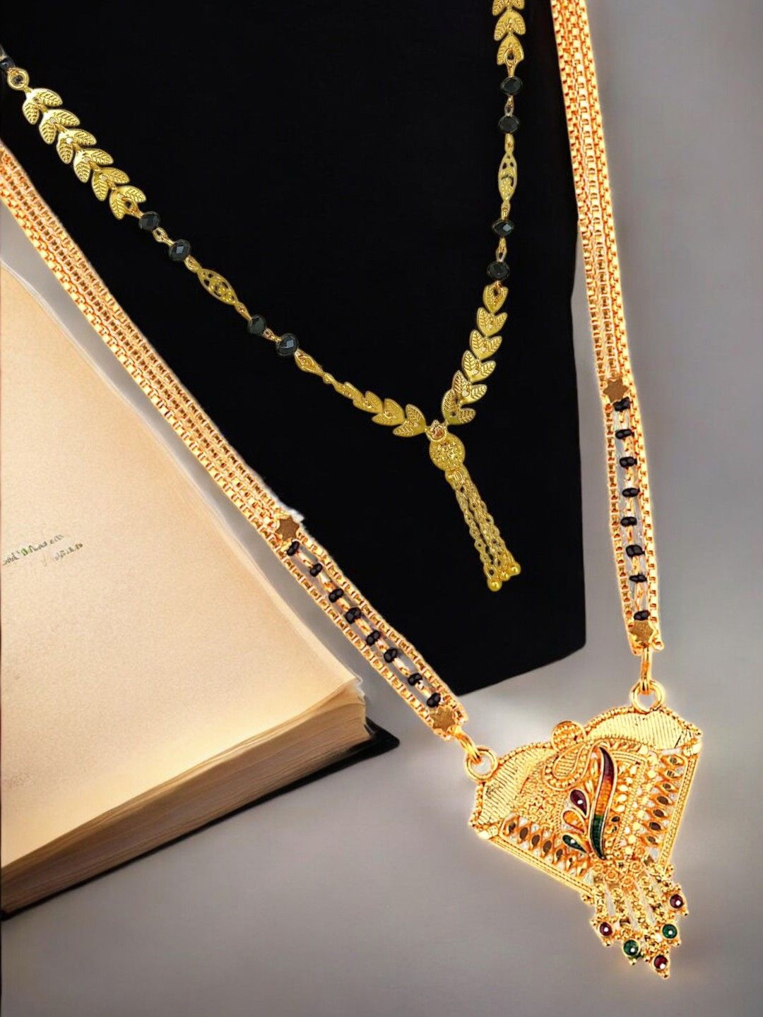 

FEMMIBELLA Gold-Plated Artificial Stones and Beads Mangalsutra