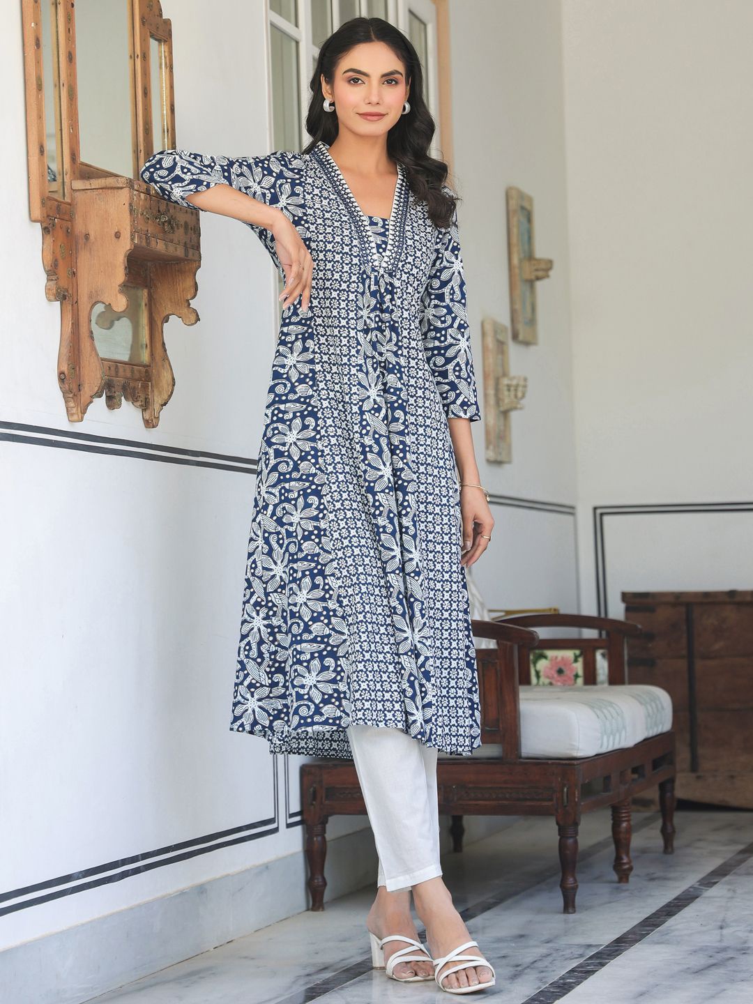 

Janasya Women Navy Blue Pure Cotton Yoke Embroidery Floral A-line Kurta