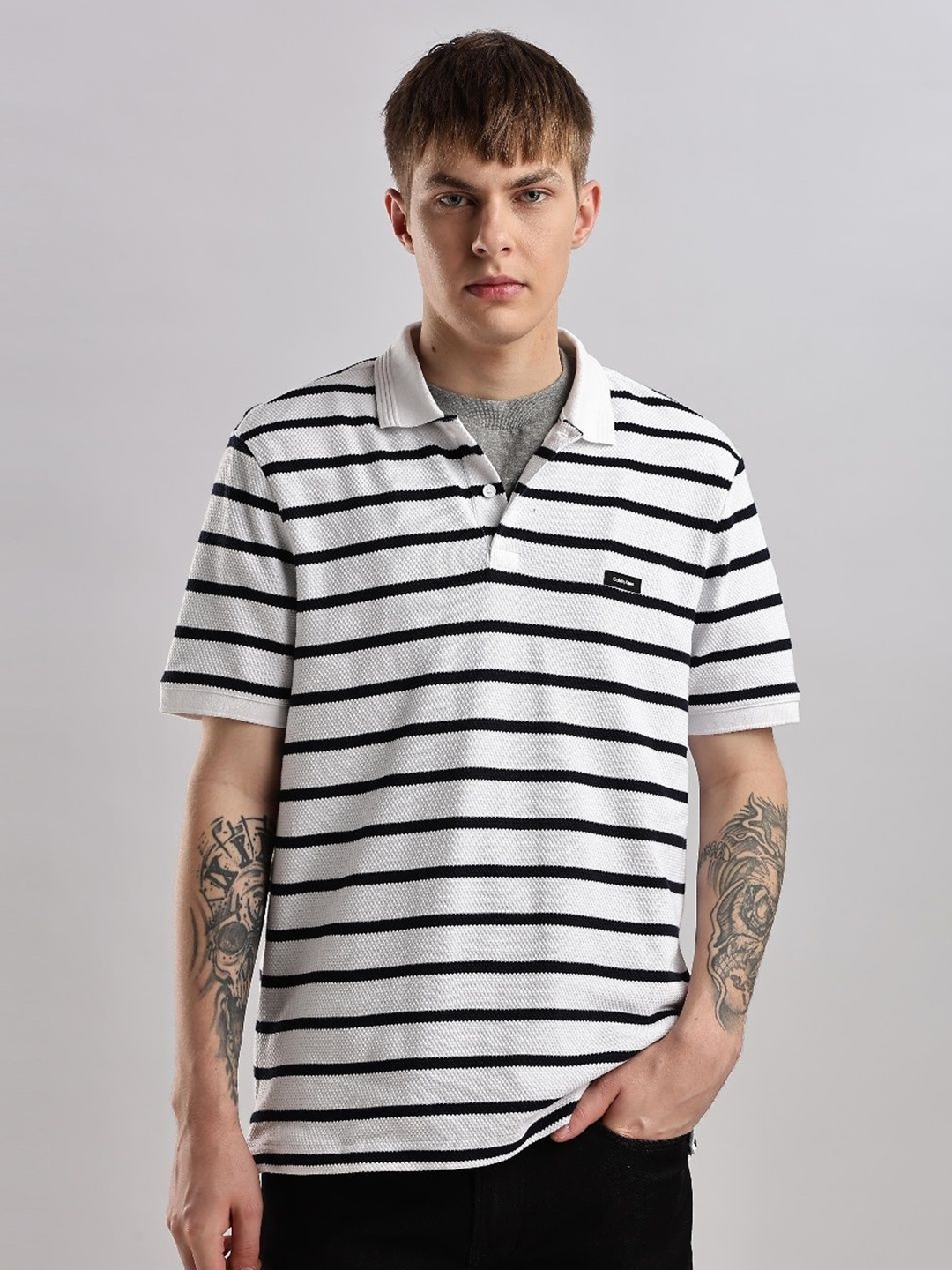 

Calvin Klein Jeans Men Striped Polo Collar T-shirt, White
