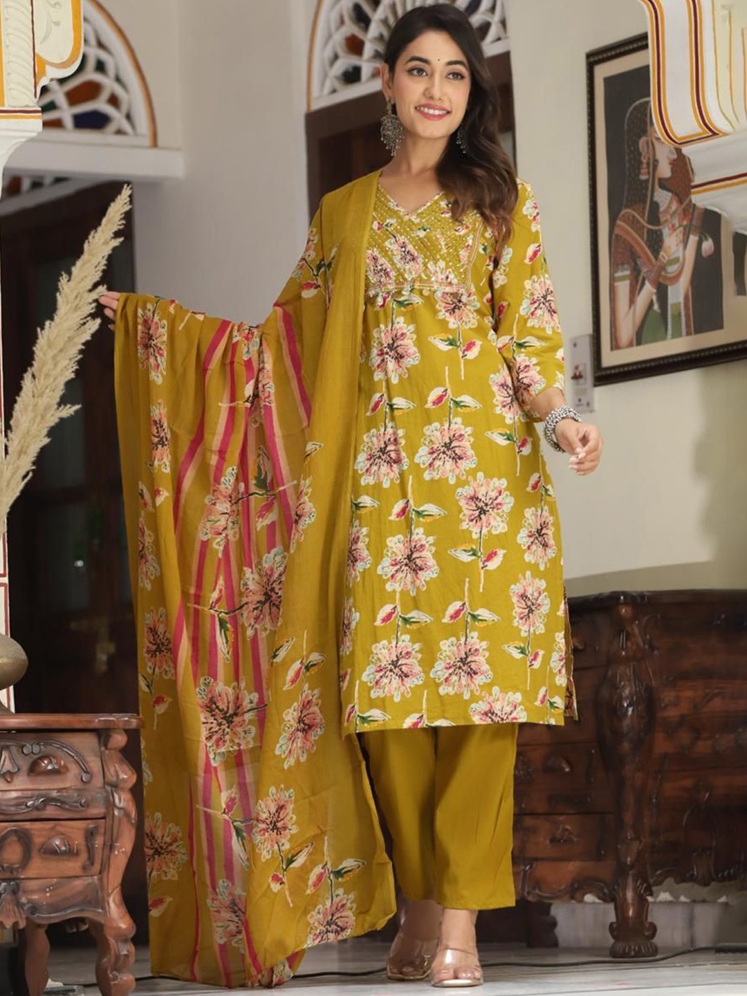 

DARVIKAA COLLECTION Women Floral Printed Regular Beads and Stones Pure Cotton Kurta with Trousers & With, Mustard
