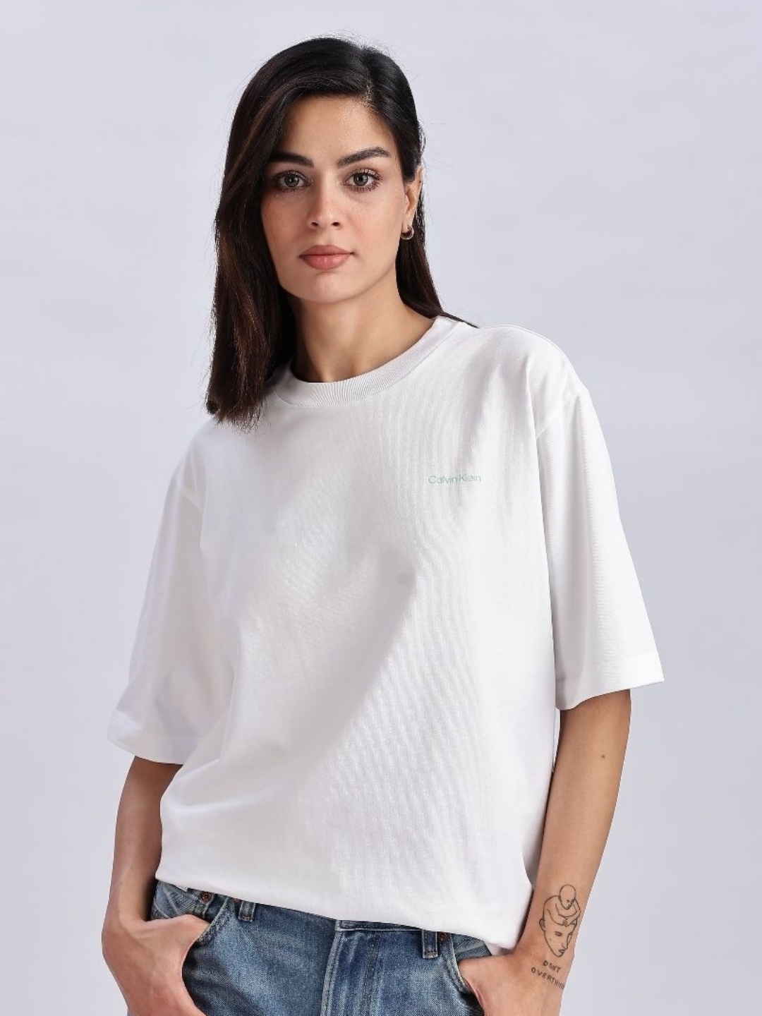 

Calvin Klein Jeans Women Typography Printed Drop-Shoulder Sleeves Organic Cotton T-shirt, White