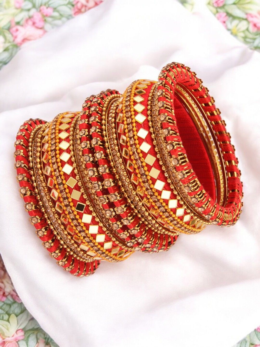 

FEMMIBELLA Set Of 18 Gold-Plated Cubic Zirconia-Studded Silk Thread Mirror Work Bangles