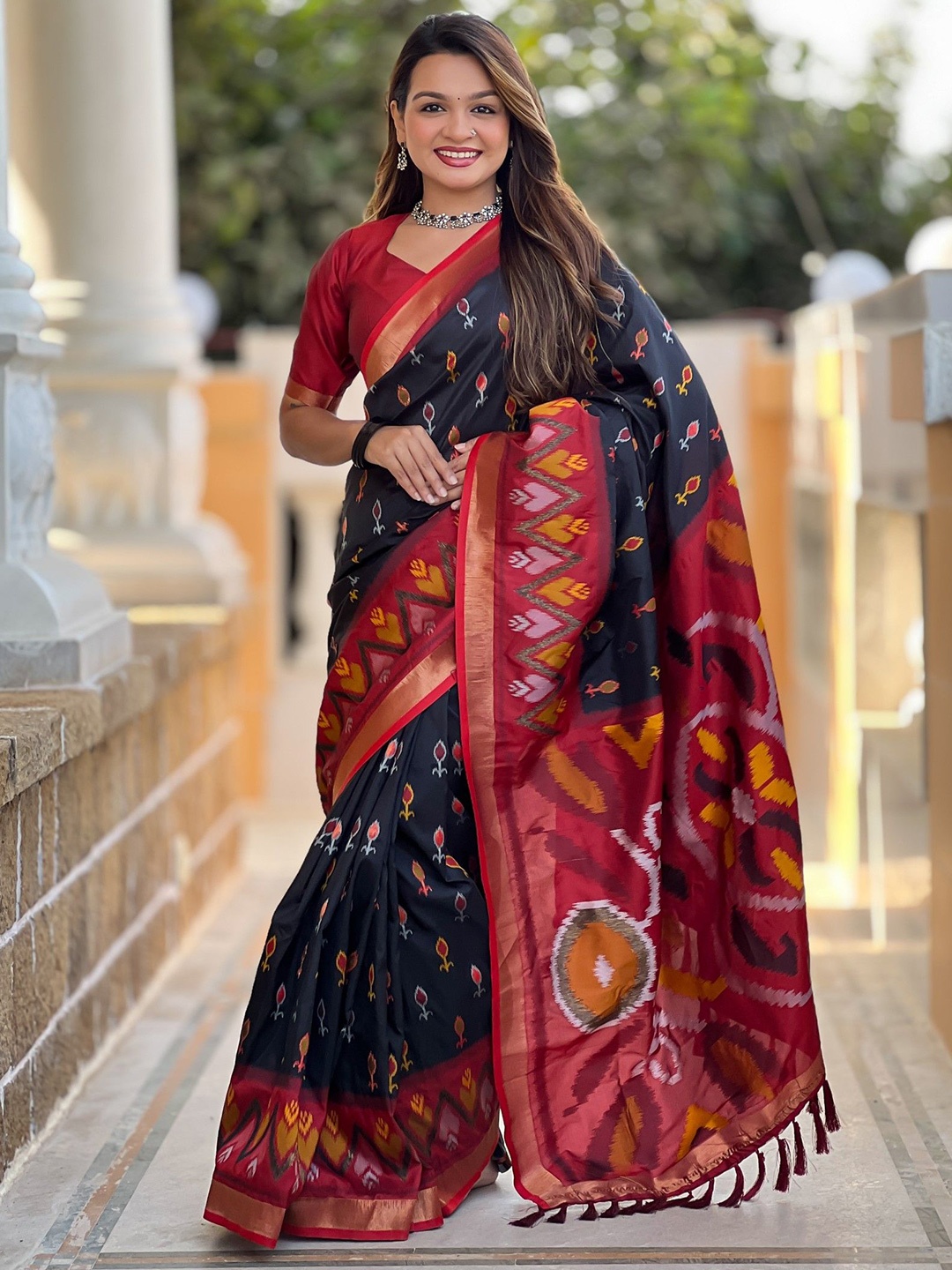 

Mitera Ethnic Motifs Zari Silk Blend Ikat Saree, Black