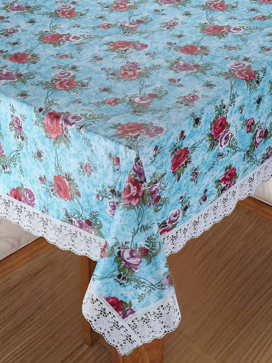 

Homerz Blue Floral Waterproof Plastic 4-Seater Table Cover