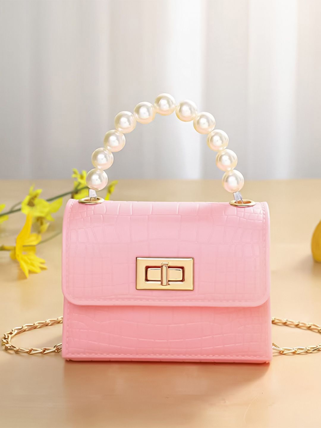 

HAUTE SAUCE by Campus Sutra Textured PU Bucket Handheld Bag with Fringed, Pink