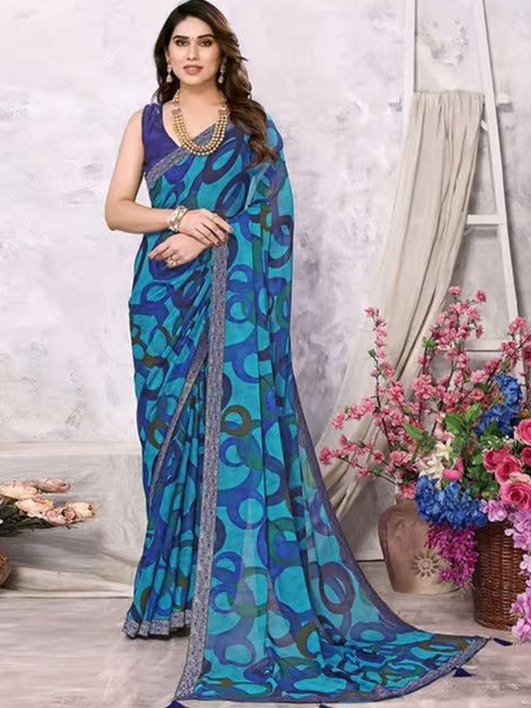 

Styleveda Pure Georgette Block Print Saree, Blue