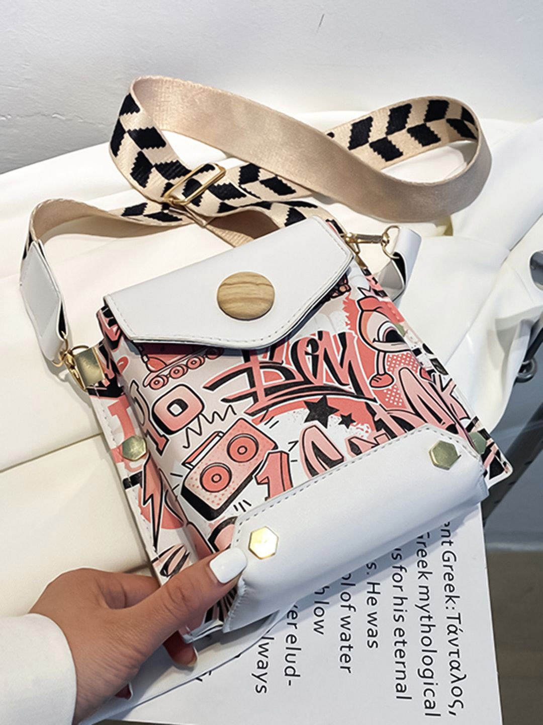 

HAUTE SAUCE by Campus Sutra Printed PU Bucket Sling Bag with Cut Work, White