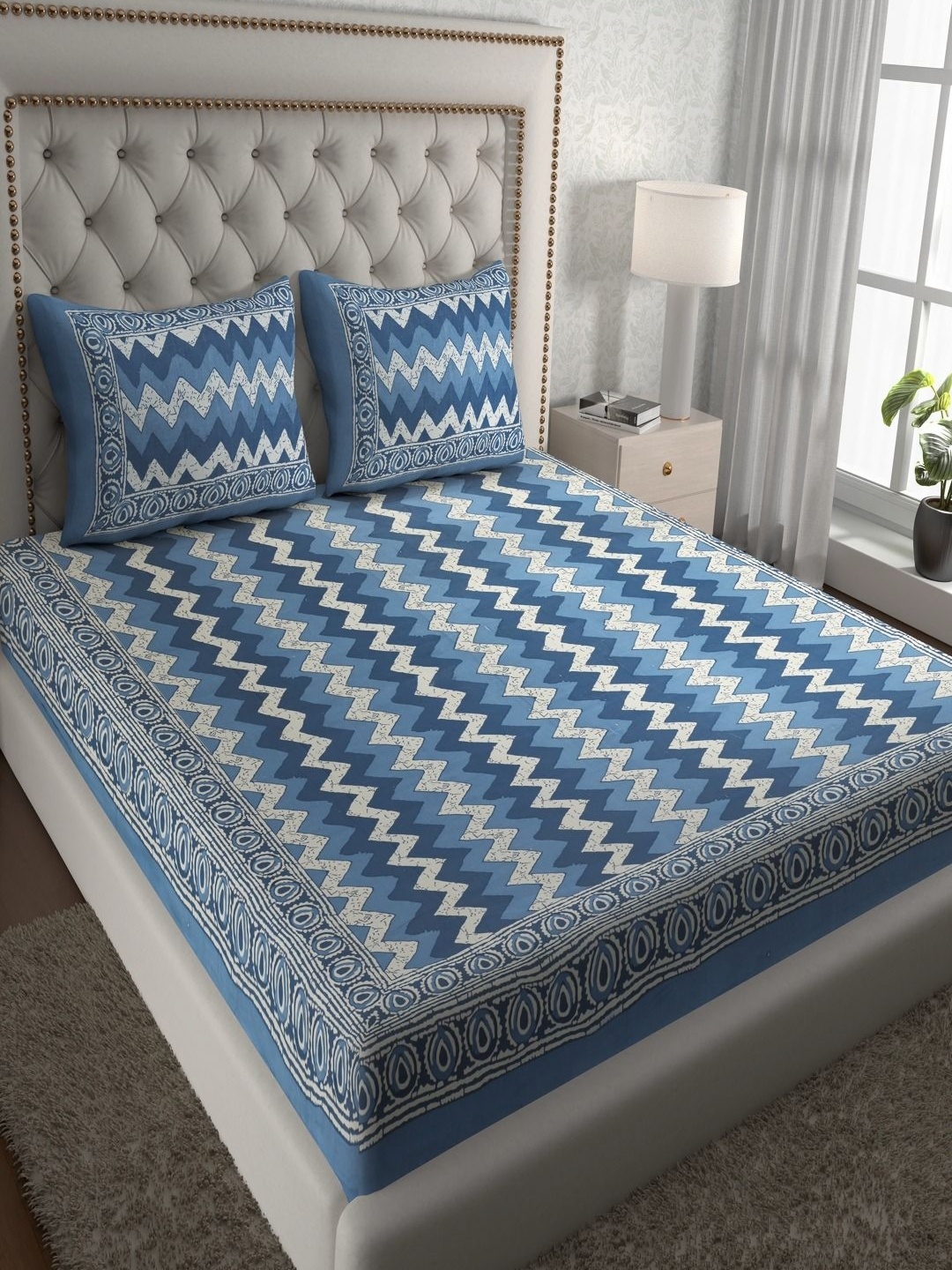 

Myntra Elegant Homes Blue & White Geometric 120 TC Queen Bedsheet with 2 Pillow Covers