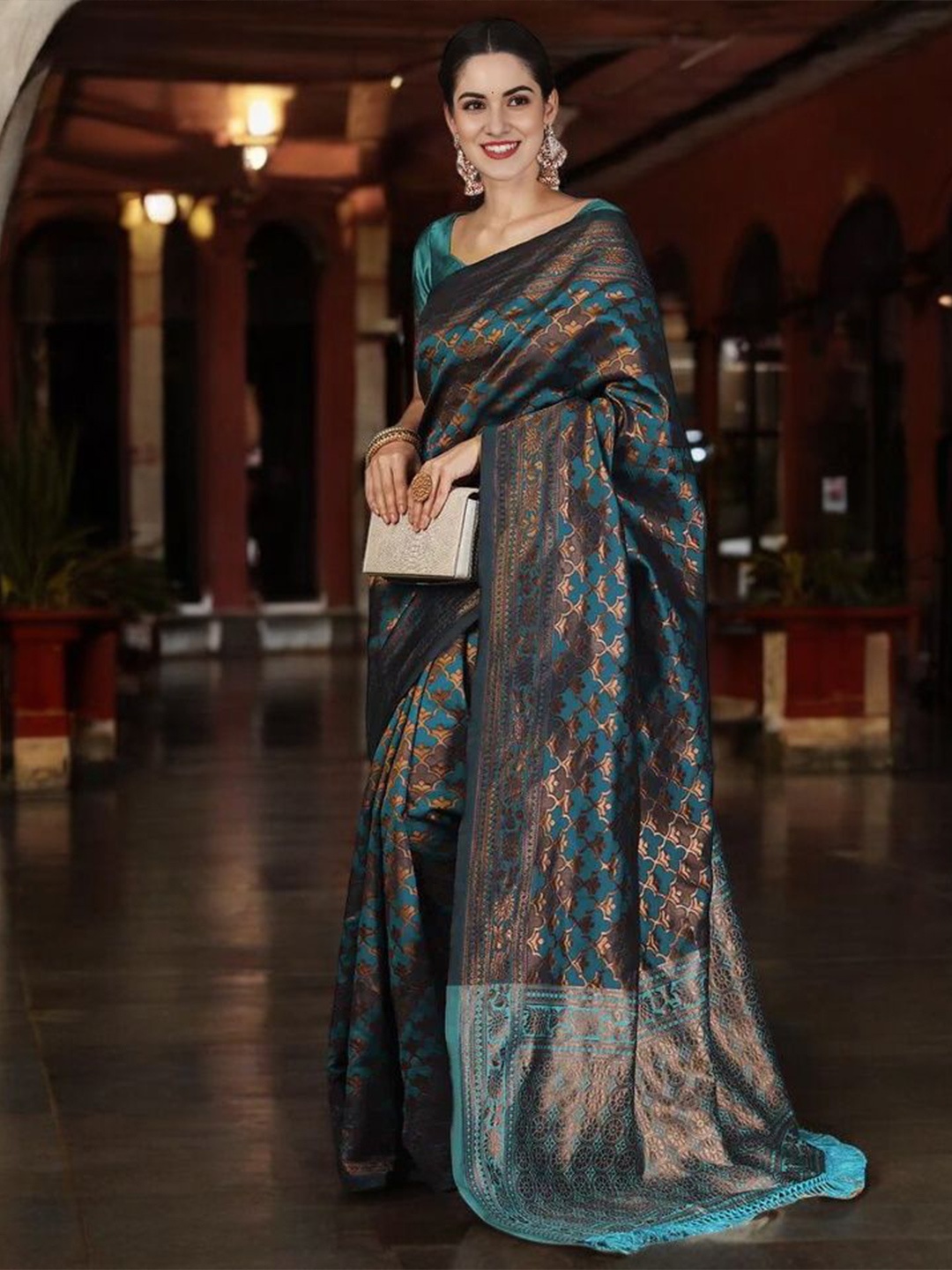 

Mitera Woven Design Zari Silk Blend Banarasi Saree, Teal