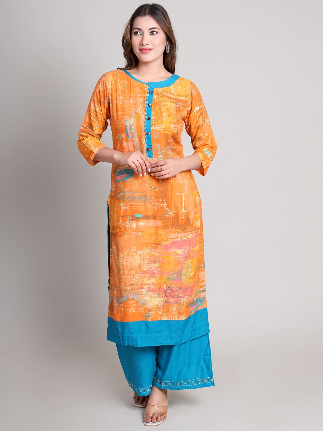 

DELIS Women Printed Regular Beads and Stones Kurta with Palazzos, Orange