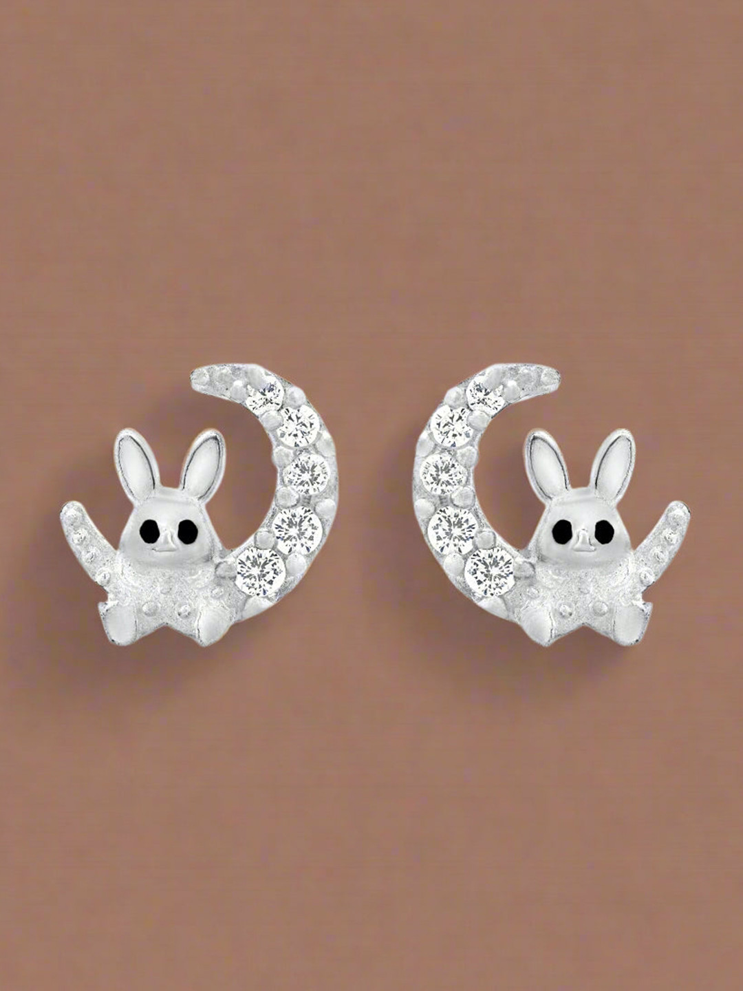 

Nipura Crescent Shaped Studs Earrings, Silver