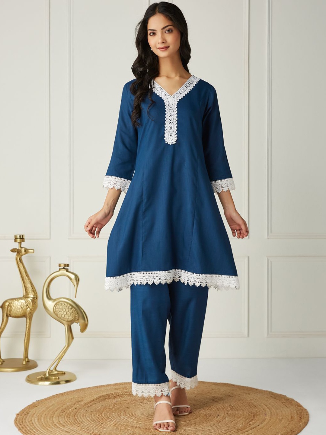 

FASHVERSE Women Printed Regular Kurta with Trousers, Teal