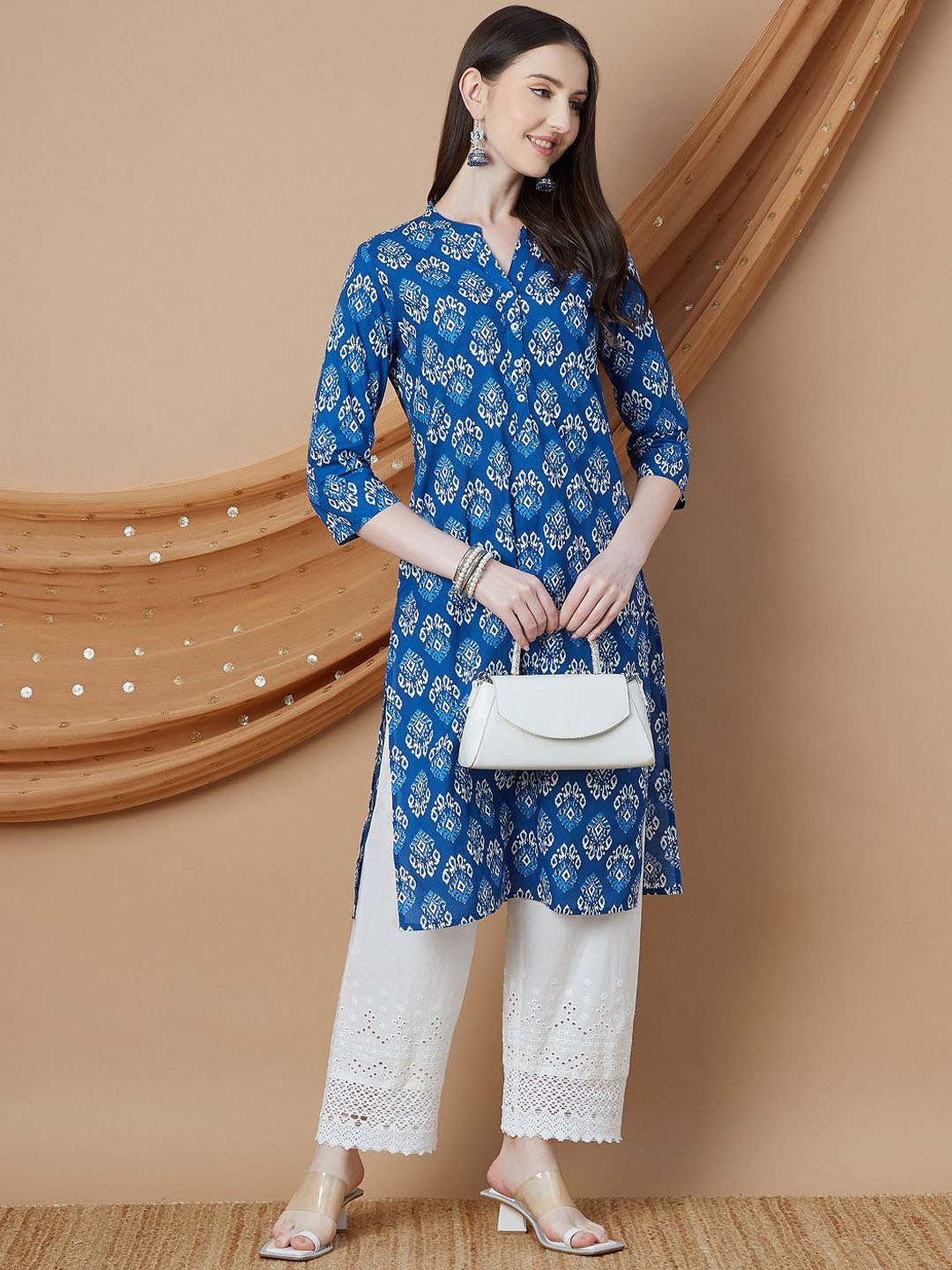 

Melange by Lifestyle Women Ethnic Motifs Printed Flared Sleeves Thread Work Kurta, Violet