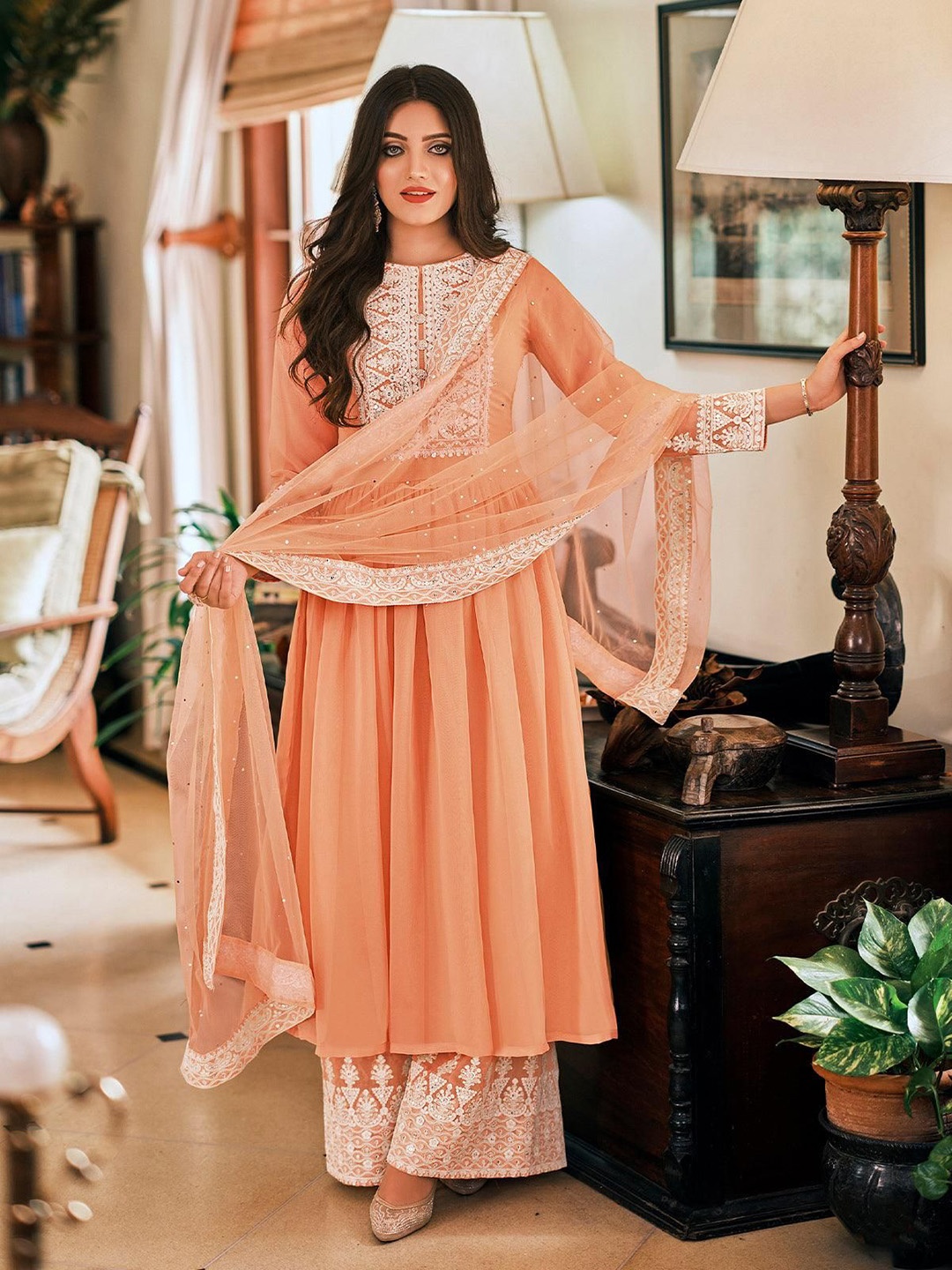 

ODETTE Women Floral Embroidered Pleated Thread Work Kurta with Palazzos & With Dupatta, Peach
