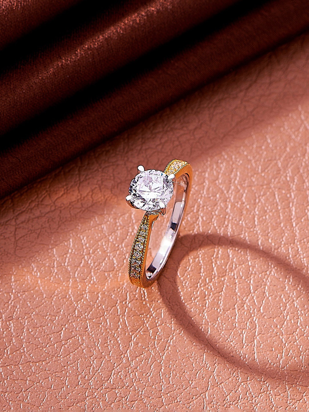 

Nipura 925 Sterling Silver Gold-Plated CZ Studded Angelix Solitaire Finger Ring