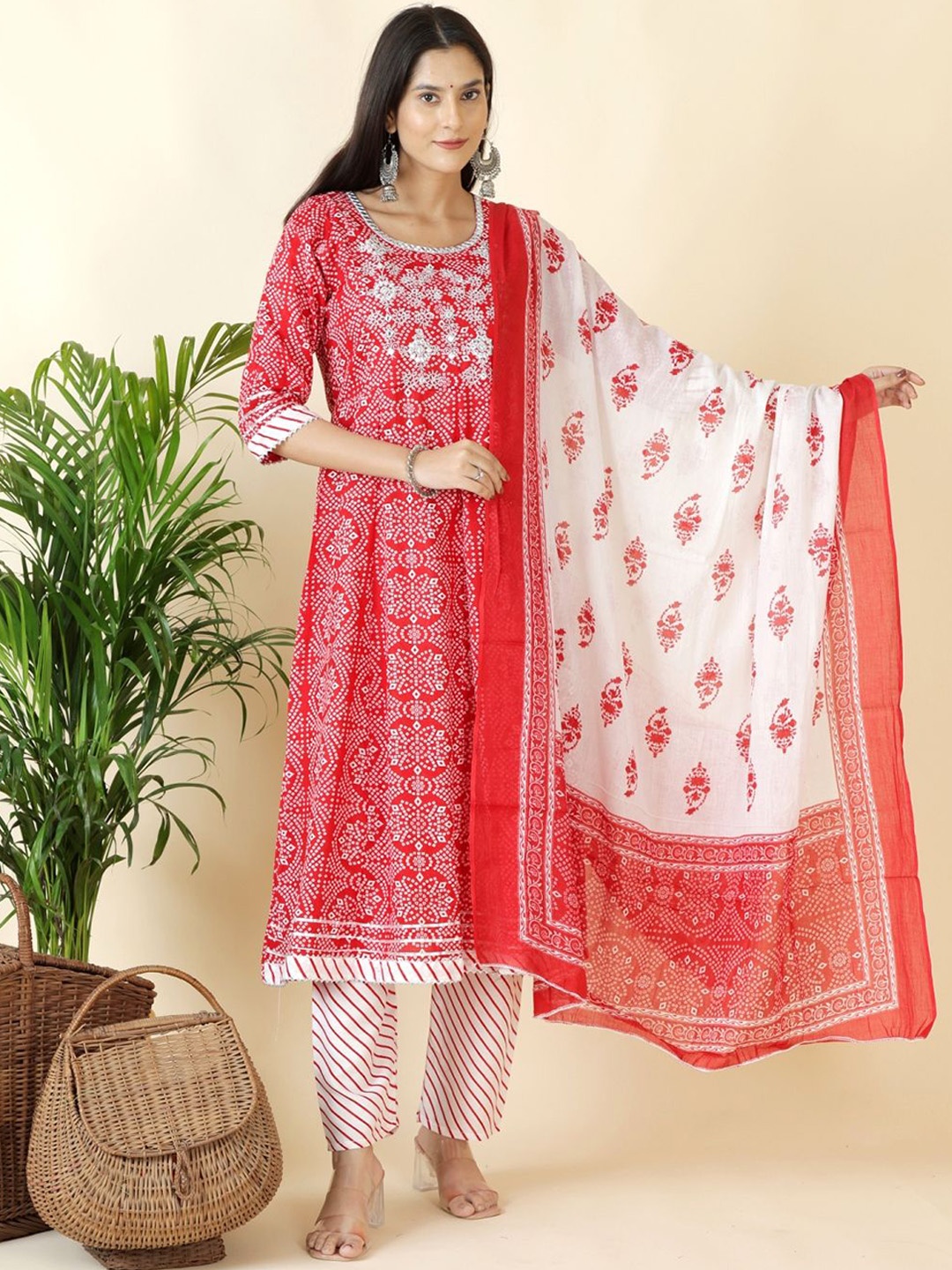 

Moda Rapido Women Bandhani Printed Empire Kurta with Palazzos & With Dupatta, Red