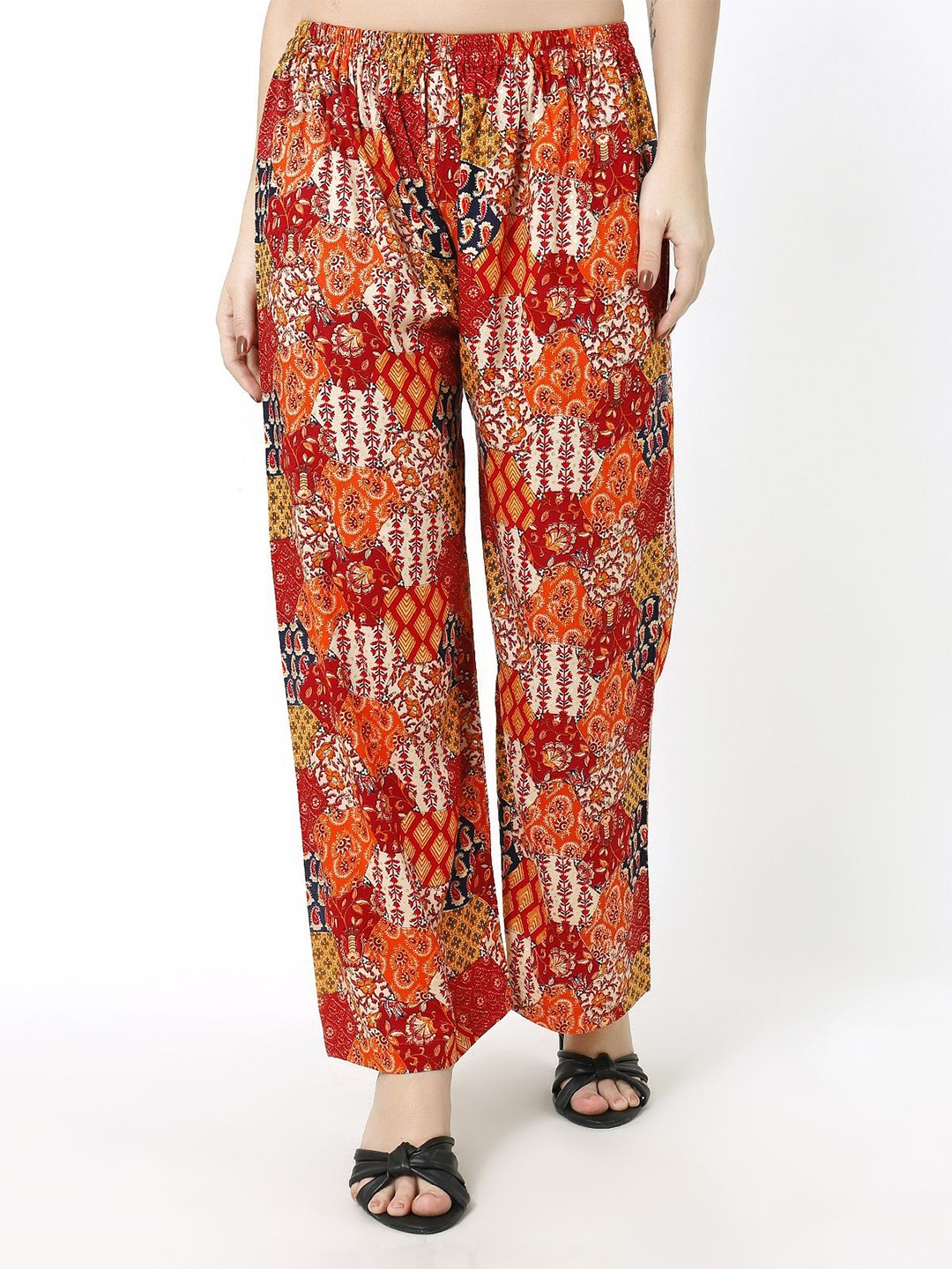 

Trendzmy Women Floral Printed Knitted Palazzos, Orange