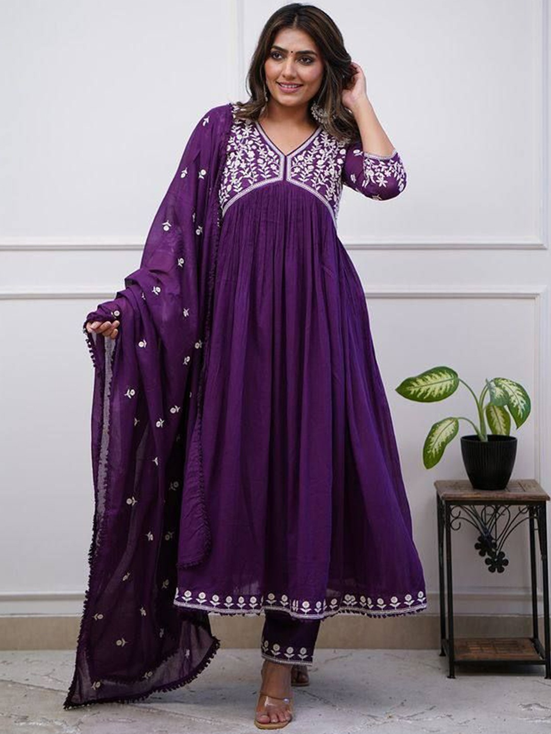 

KALINI Women Ethnic Motifs Embroidered Angrakha Thread Work Raw Silk Kurta with Trousers & With Dupatta, Purple