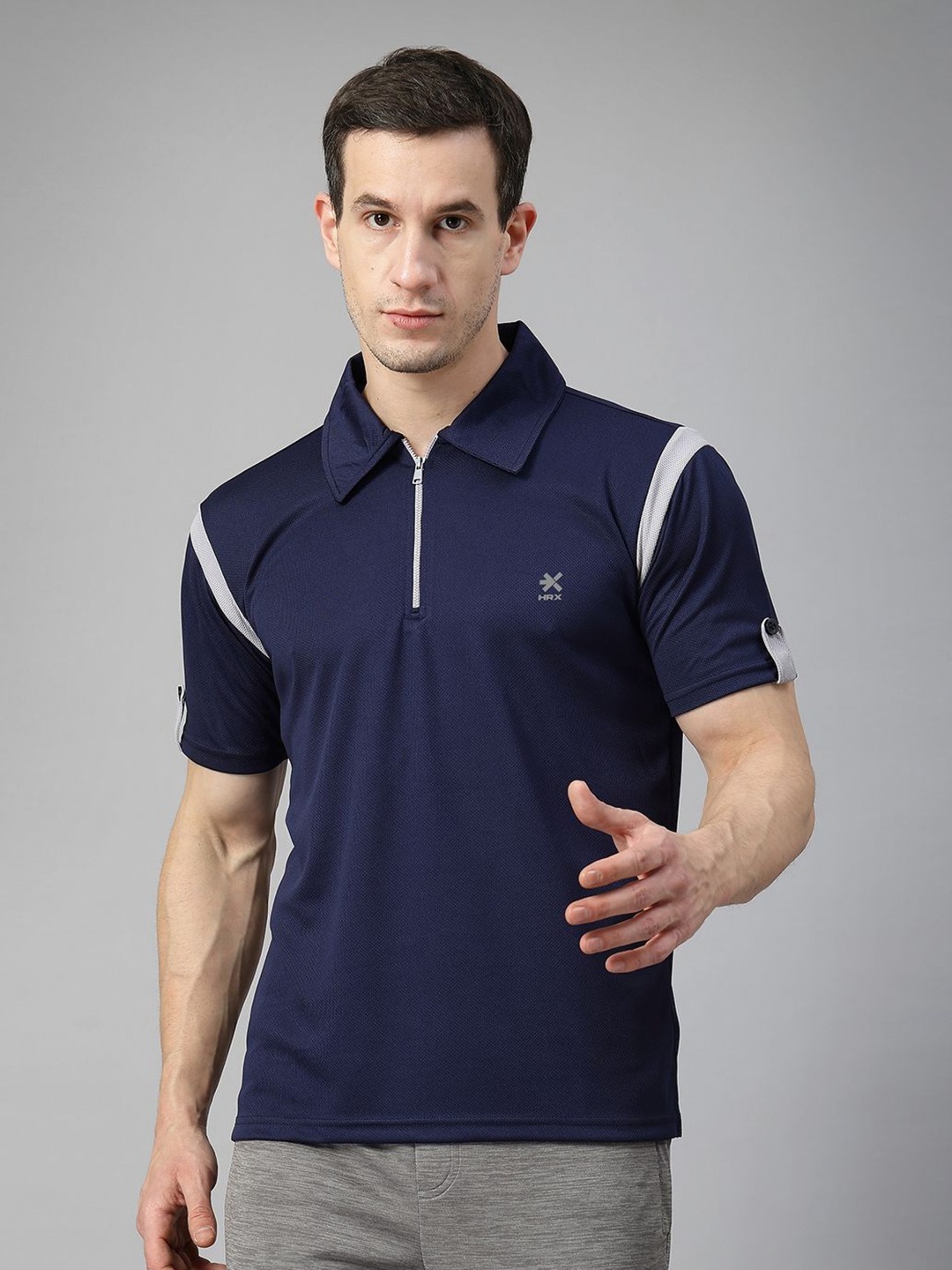 

HRX by Hrithik Roshan Men Polo Neck Regular Fit Gym Sports Zipper Tshirt, Navy blue