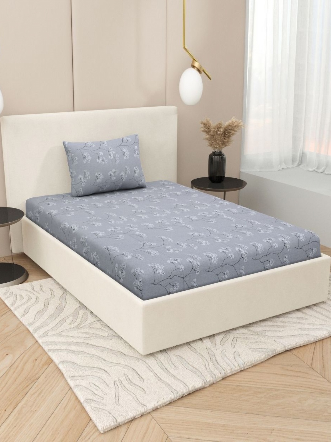 

Jaipur Weaves Grey & Black Floral 180 TC Single Bedsheet with 1 Pillow Covers