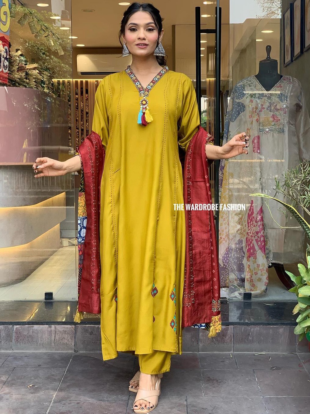 

KALINI Women Printed Regular Thread Work Chanderi Silk Kurta with Trousers & With Dupatta, Mustard