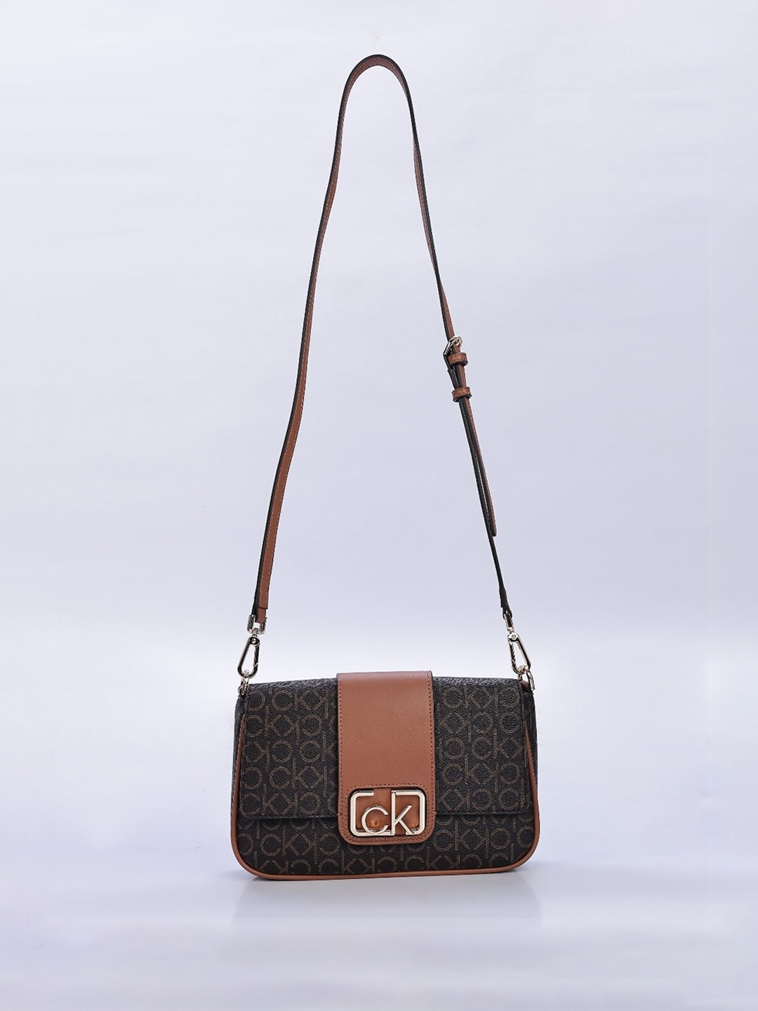 

Calvin Klein Printed Structured Sling Bag, Brown