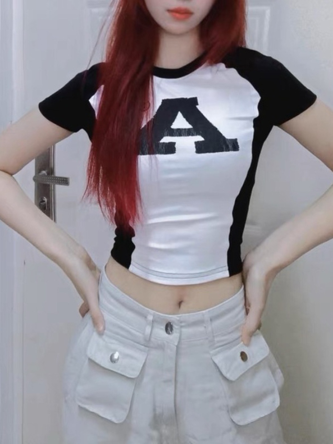 

StyleCast x Revolte Women Colourblocked fitted Crop Top, Black
