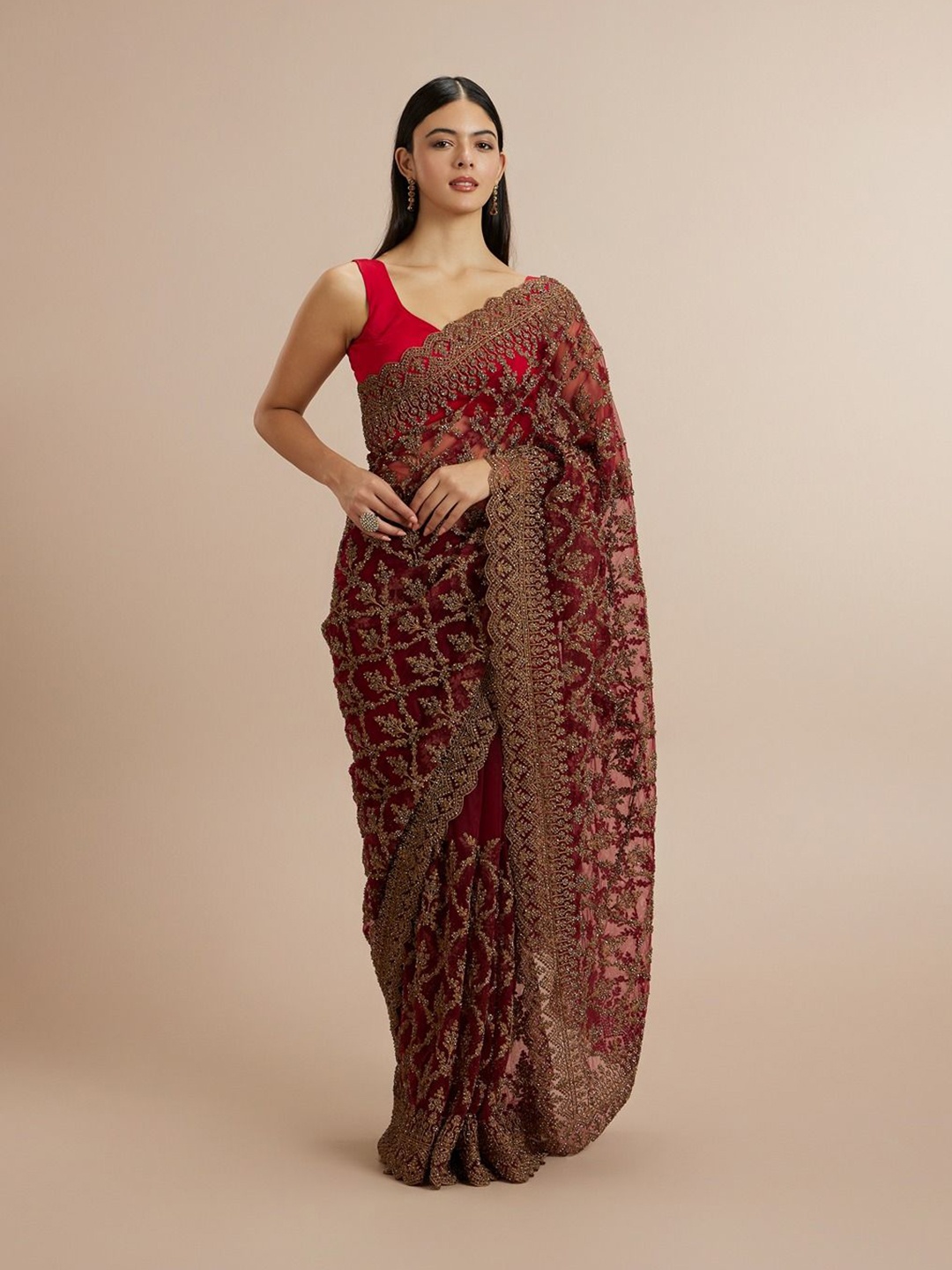 

Twamev Embellished Zari Net Designer Saree, Rust