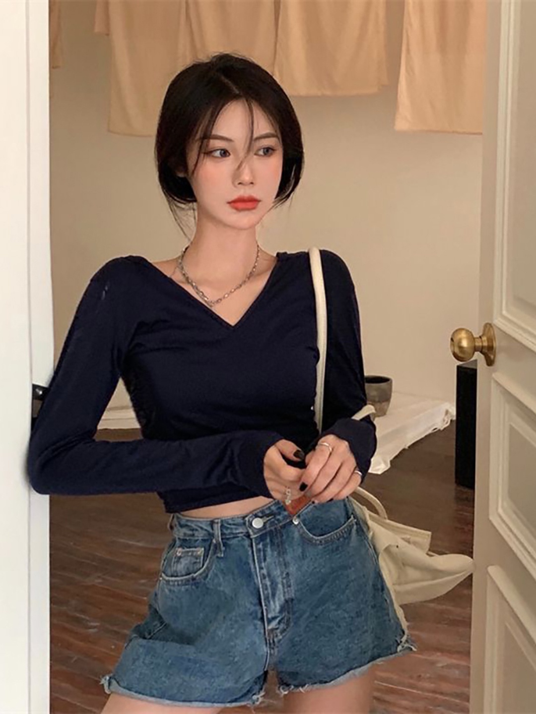 

StyleCast x Revolte Solid V Neck Regular Crop Top, Navy blue