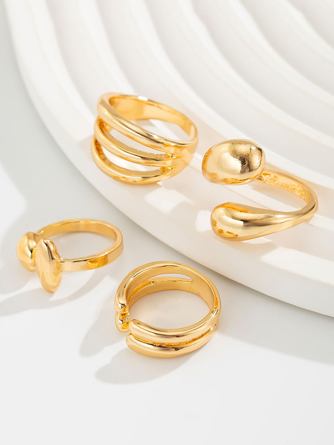

LULU & SKY Set Of 4 Gold-Plated Adjustable Finger Rings
