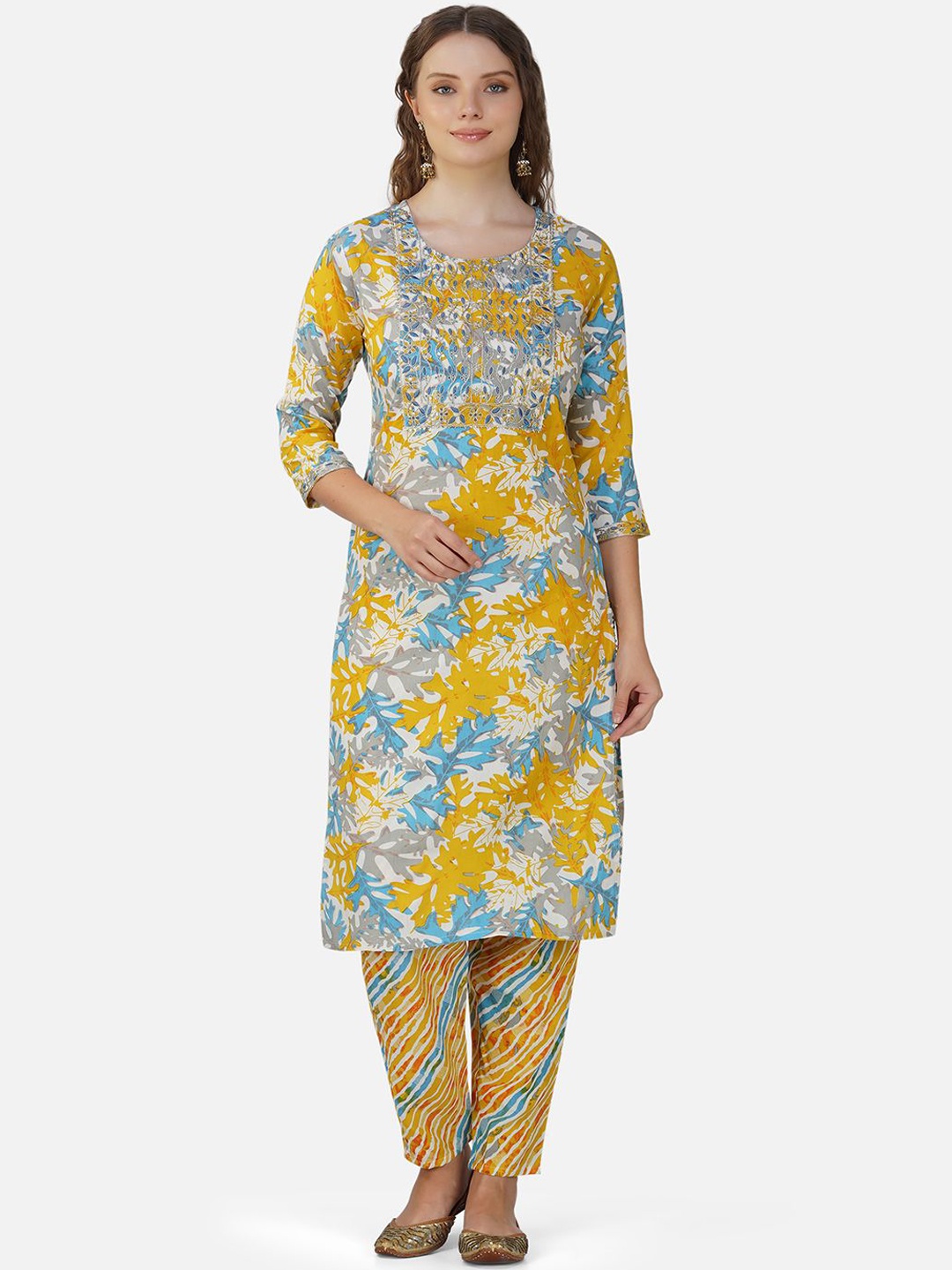

Charitra Women Floral Printed Regular Kurta with Trousers, Mustard