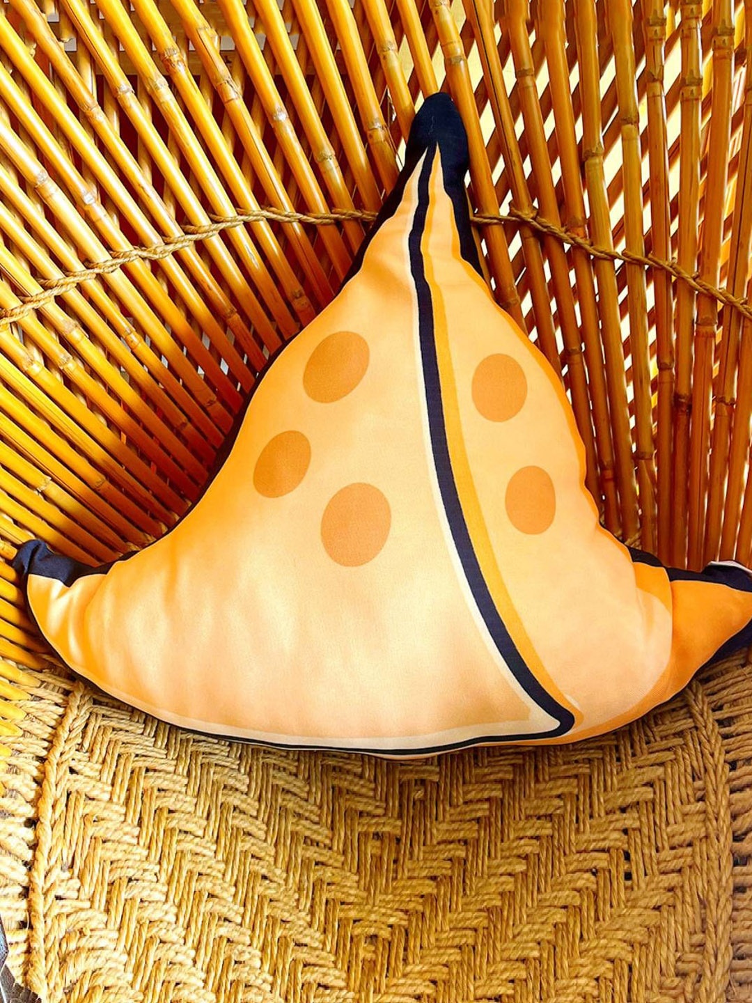 

Indigifts Yellow & Black Printed Samosa Shaped Cushion